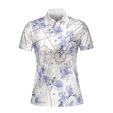 White aviation-theme women's polo shirt with purple floral pattern