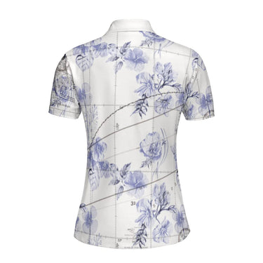 White aviation-theme women's polo shirt with purple floral pattern
